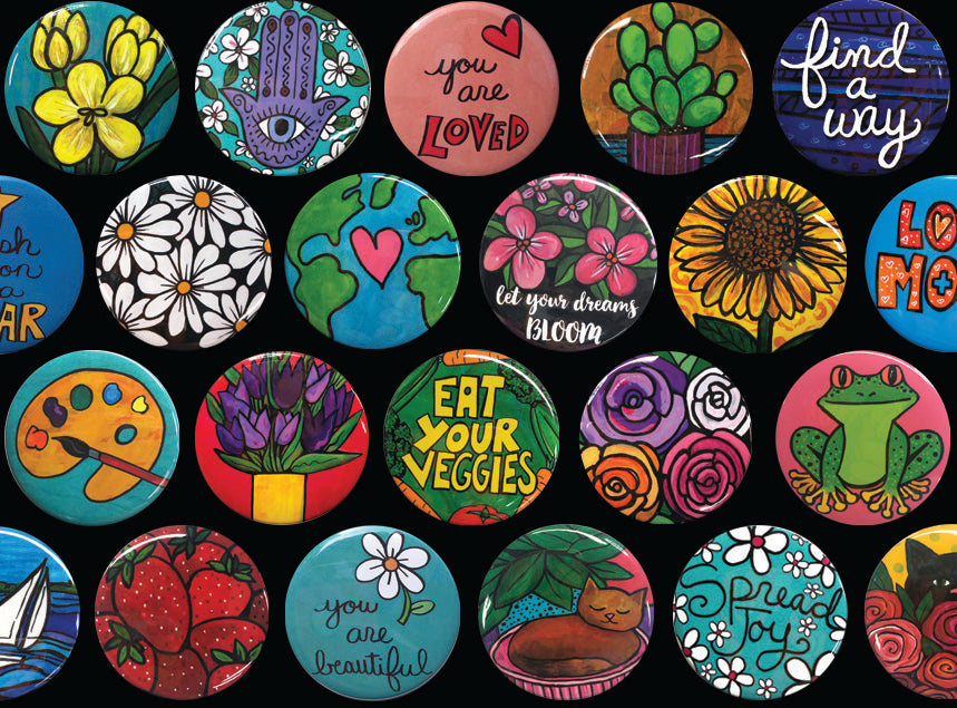collection of magnets and pinback buttons made by Claudine Intner