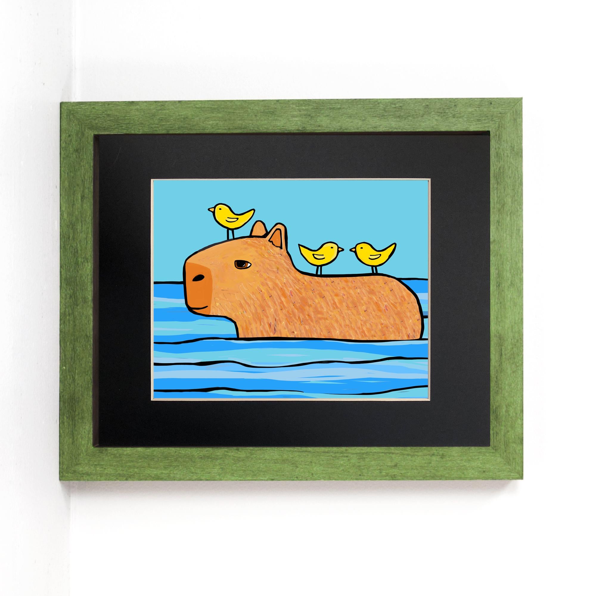 Capybara Friend to All print shown in black mat and green wood frame