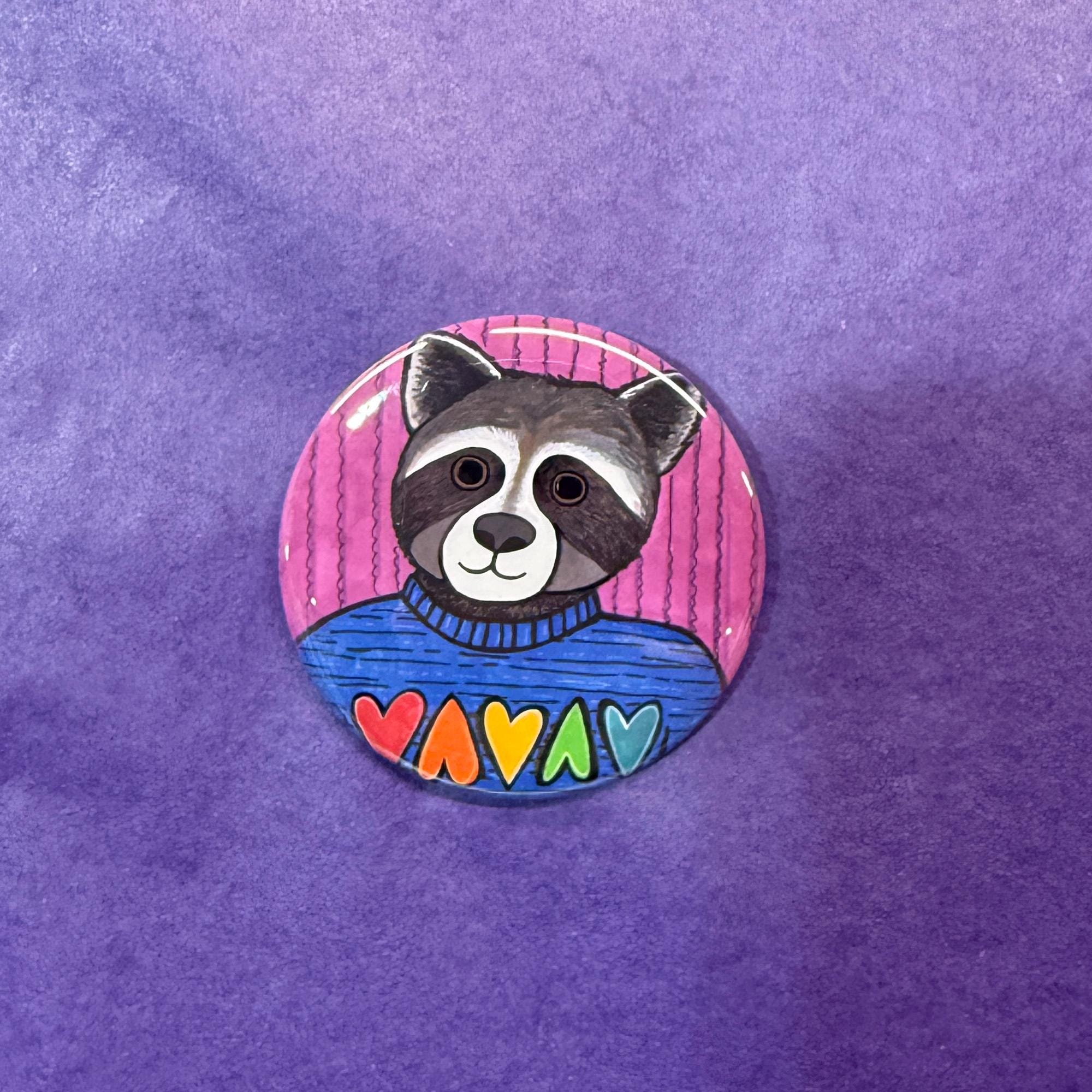 Roxy Raccoon Pride magnet on purple background