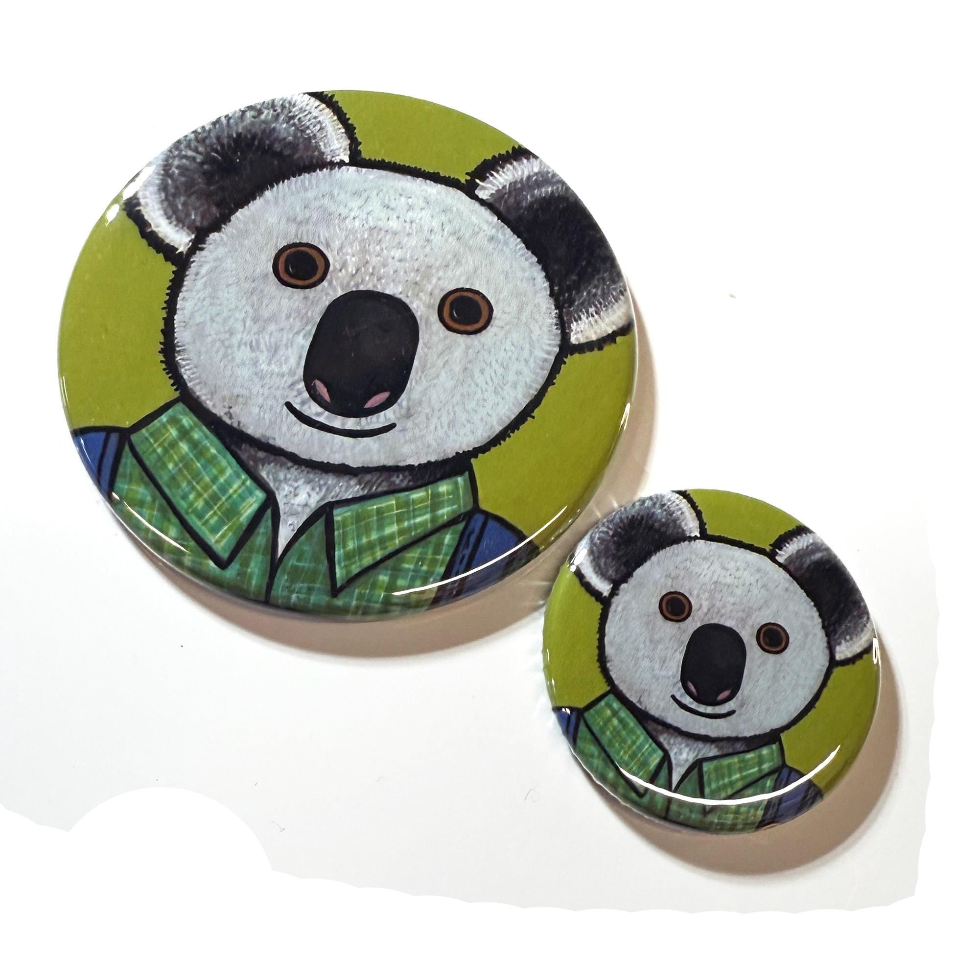 Round button designs shown in 2 sizes - 2.25 inch and 1.25 inch. Koala bear in green plaid shirt and blue overalls on chartreuse green background.