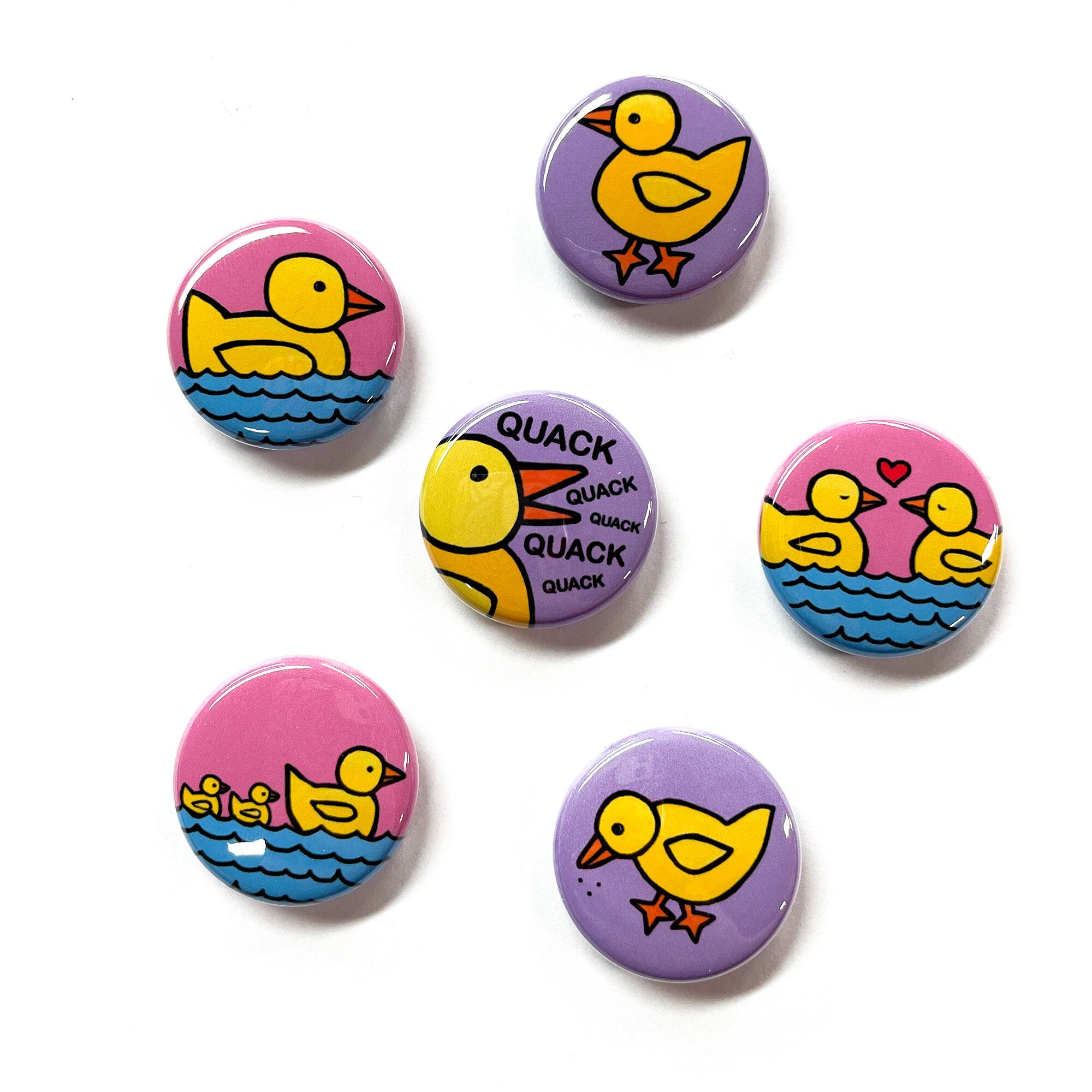 6 yellow duck designs on pink or purple