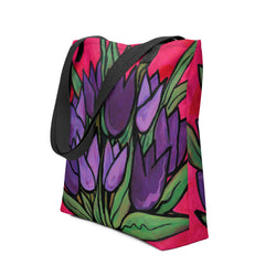 side view of Purple Tulip Passion Tote Bag with purple tulips and long green leaves on a magenta red background 