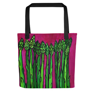 front view of asparagus tote bag with black straps. green asaparagus is shown on a deep magenta background.