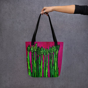 Outstretched arm holding Asparagus Tote Bag