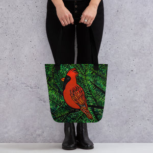 Woman in black holding Cardinal Tote Bag