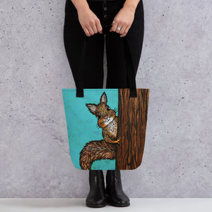 Woman dressed in black holding Squirrel Tote Bag