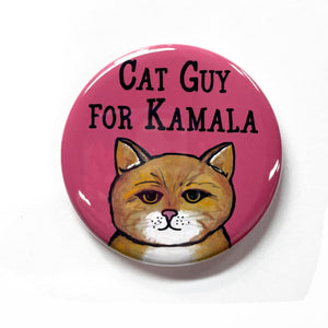 Pink button with yellow cat and the words Cat Guy for Kamala