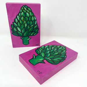 artichoke paintings - one upright, one laying on its back