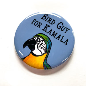 round pin with words Bird Guy for Kamala on blue with macaw