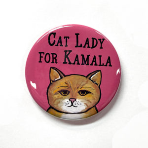 Pink button with yellow cat and the words Cat Lady for Kamala