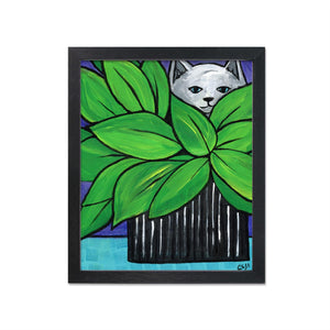 Gray and white cat peeking over green leafy plant in black vase with white lines. Table is light blue with square patterns. Background is purplish blue.
