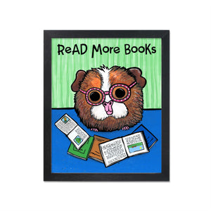 Art print with Ginger the Guinea Pig reading 5 different art books. The optional saying Read More Books is across the top.