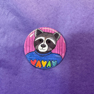 Roxy Raccoon Pride magnet on purple background