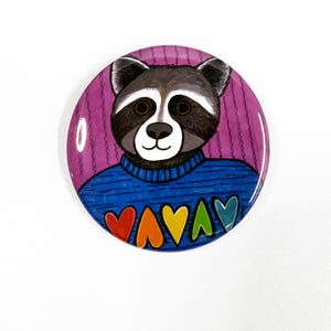 Round button with Roxy Raccoon on a white background