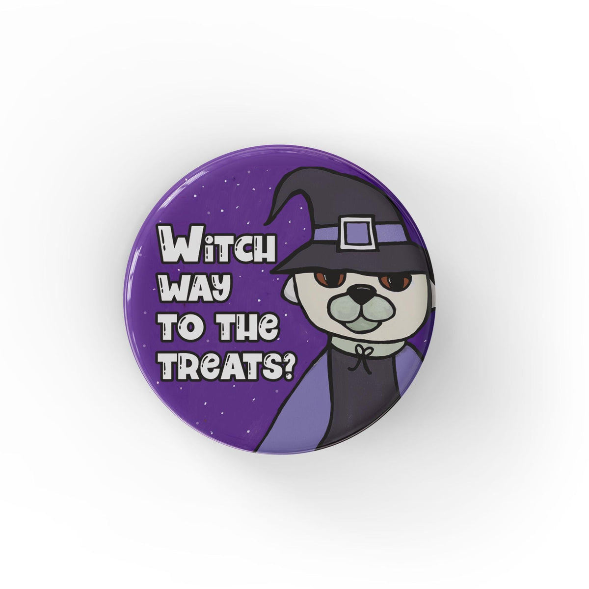 Round purple button with the words Witch Way To The Treats? in a fun white font next to a cream and gray pug dog in a black and purple witch costume