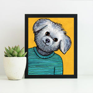 another view of Millie the Shih Tzu art print showing print in a black frame next to a white pot with a succulent plant.