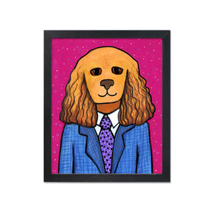Tanner the Cocker Spaniel Art Print shown in a black frame. Design features cocker spaniel in a blue plaid suit with purple polka dot tie and white dress shirt. Background is deep pink with small white, black and purple dots.