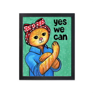 Rosie the Riveter as a Cat - Yellow Tabby cat in red head scarf and blue shirt with the words Yes We Can