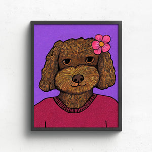 portrait of a brown golden doodle dog wearing a red sweater and pink flower in her fair. the background is purple with subtle swirling lines. shown in a black frame.