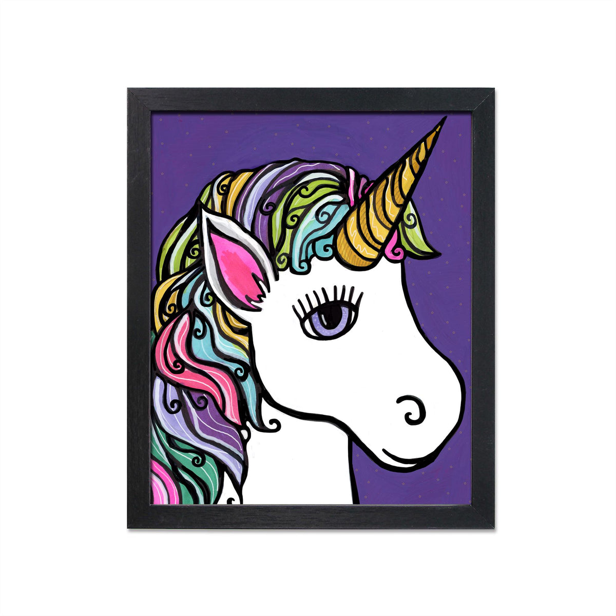 Framed unicorn art print in a black frame featuring a whimsical unicorn with rainbow colored mane on a purple background with tiny stars
