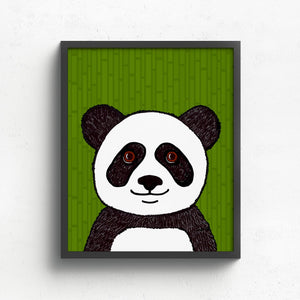 Panda art print in a black frame on white wall. The print features a black and white panda with brown eyes on a green bamboo background.