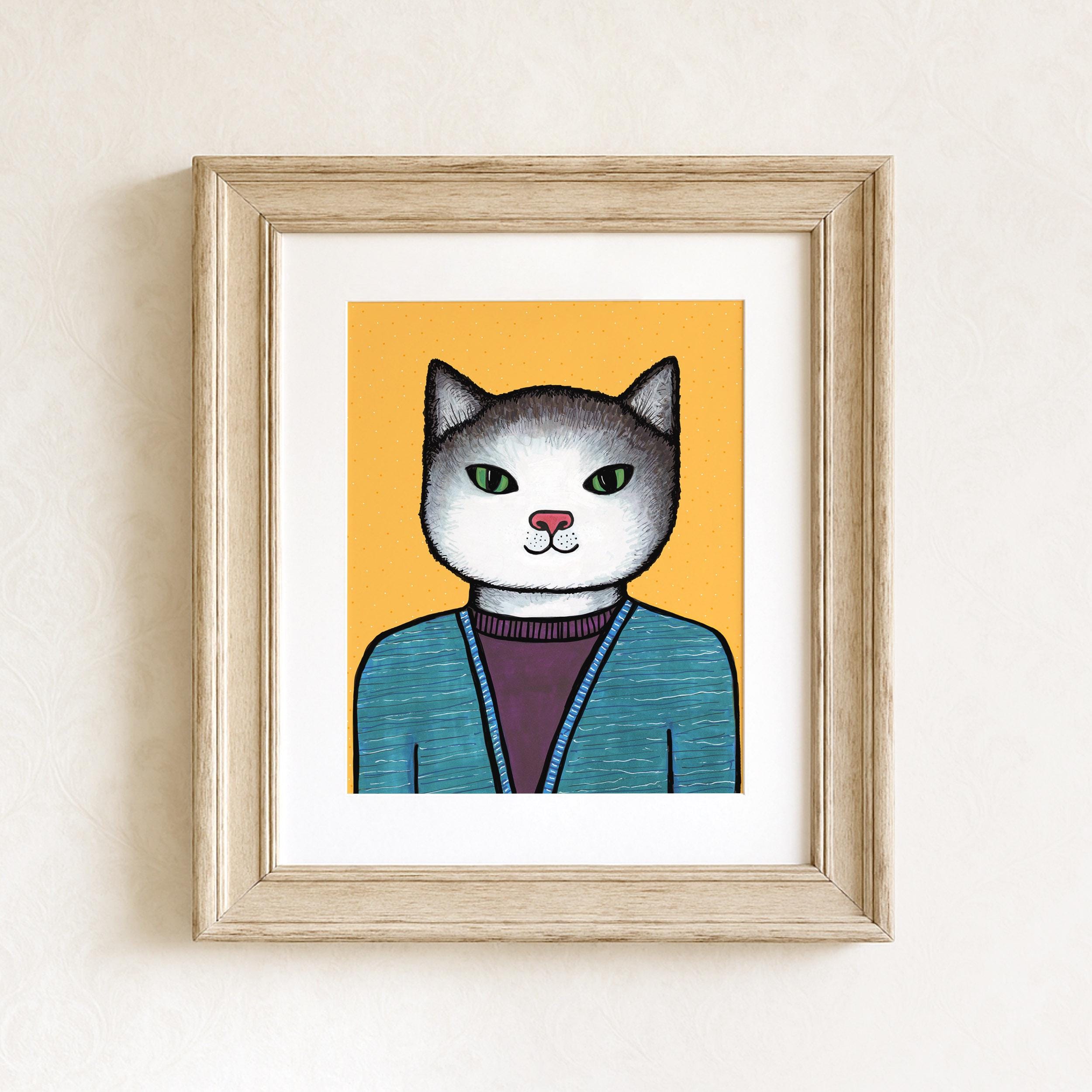Wood frame with white matte featuring Jenny the Cat art print. The cat is white and gray and wearing a purple shirt with blue cardigan. The background is yellow.