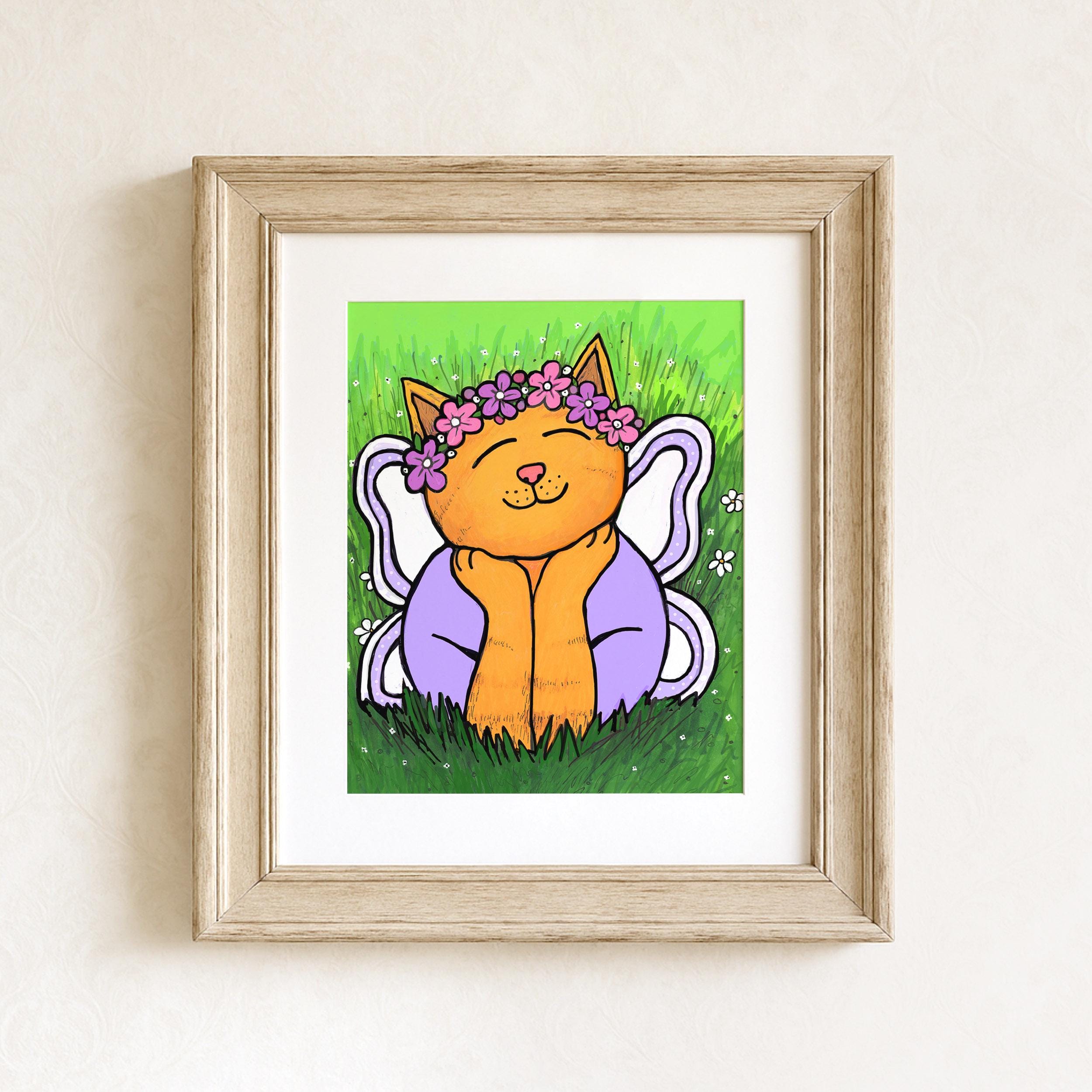 Chloe the Cat Fairy art print shown in a wooden frame with white matte