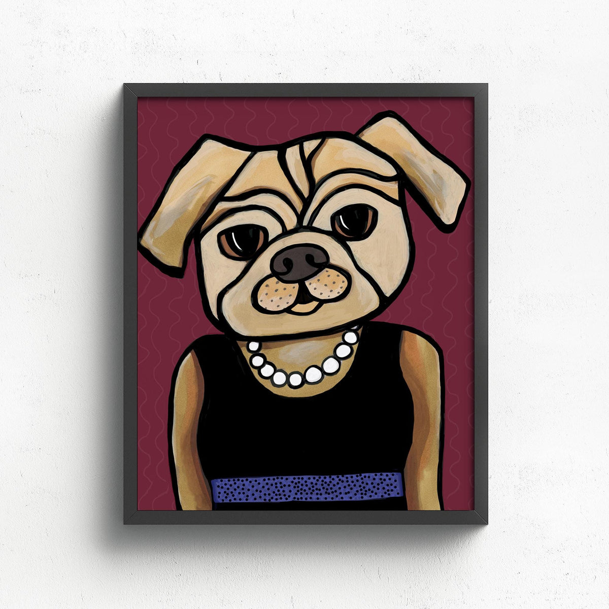 art print featuring pug in a black dress with blue belt and white pearl necklace on a deep cranberry background. print is shown in a black frame on a white wall.