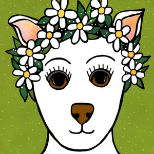 Detail view of Falline the Fairy Dog Princess face showing her brown eyes and nose, white fur, and flower crown.