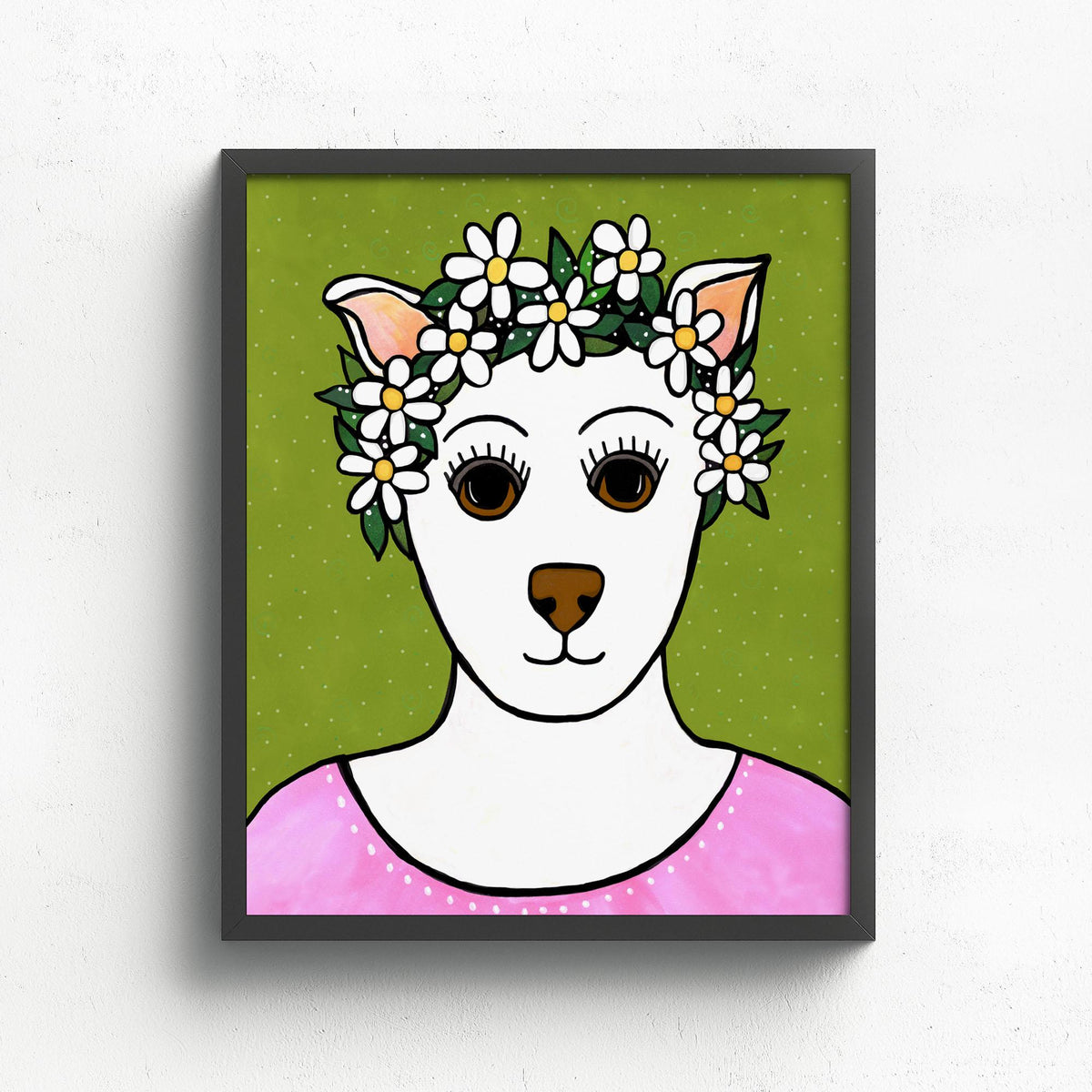 8x10 Falline the Fairy Dog Princess art print features a white dog with brown nose and eyes with a daisy and leaf crown. She is wearing a pink dress with white dot accents. The background is light green with white polka dots. It is shown in a black frame which is not included.