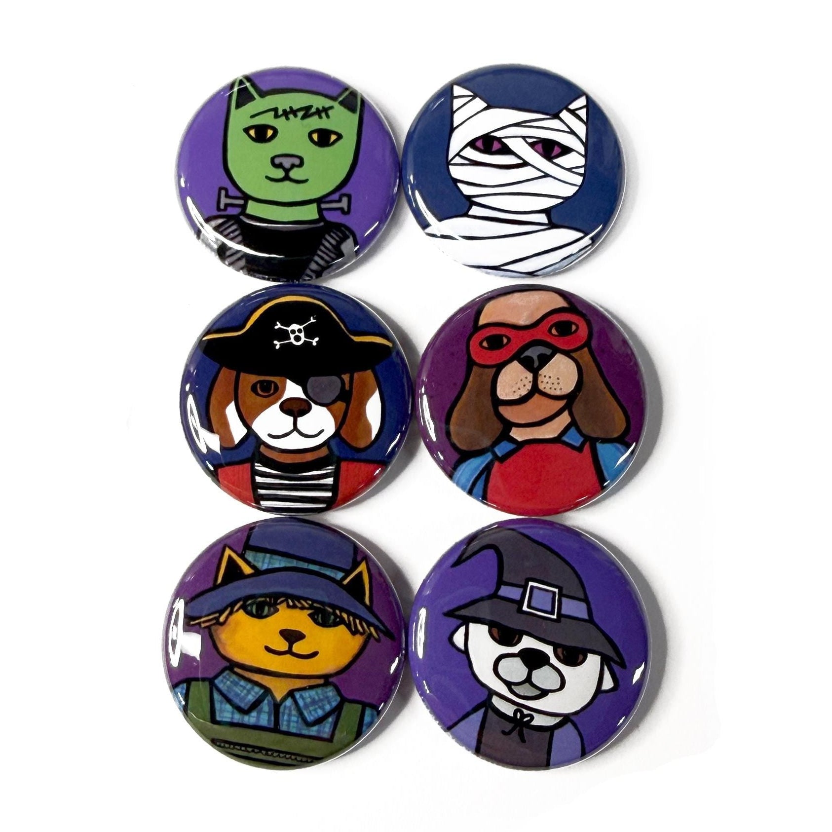 Halloween Magnet or Pin Set featuring cats and dogs in costumes - green cat as frankenstein's monster, mummy cat, pirate dog, super hero dog, scarecrow cat, and dog witch