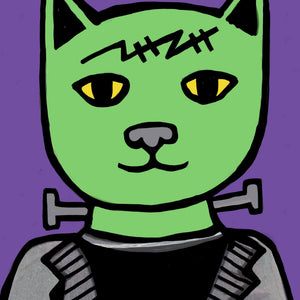 close up of Frankenstein's Cat showing the green face, gray nose, and yellow eyes