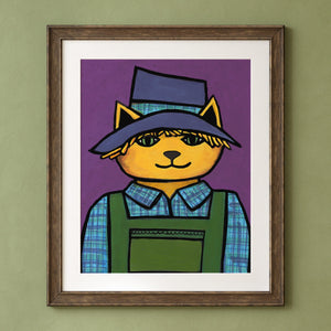 Scarecrow Cat in a wood frame with white mat on a green wall