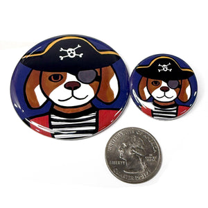 2.25 inch and 1.25 inch Pirate Dog buttons compared to a US quarter