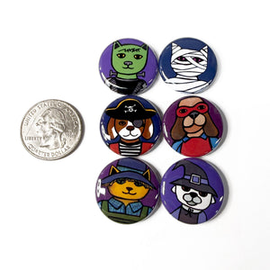 halloween cat and dog buttons compared to a US quarter