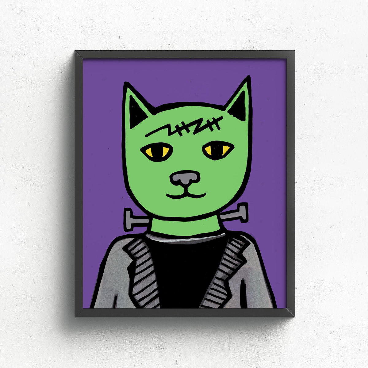 Frankenstein's Cat - 8x10 art print shown in sample black frame featuring a green cat with the iconic Frankenstein's monster scar and neck bolts. Its wearing a black suit and the background is purple.