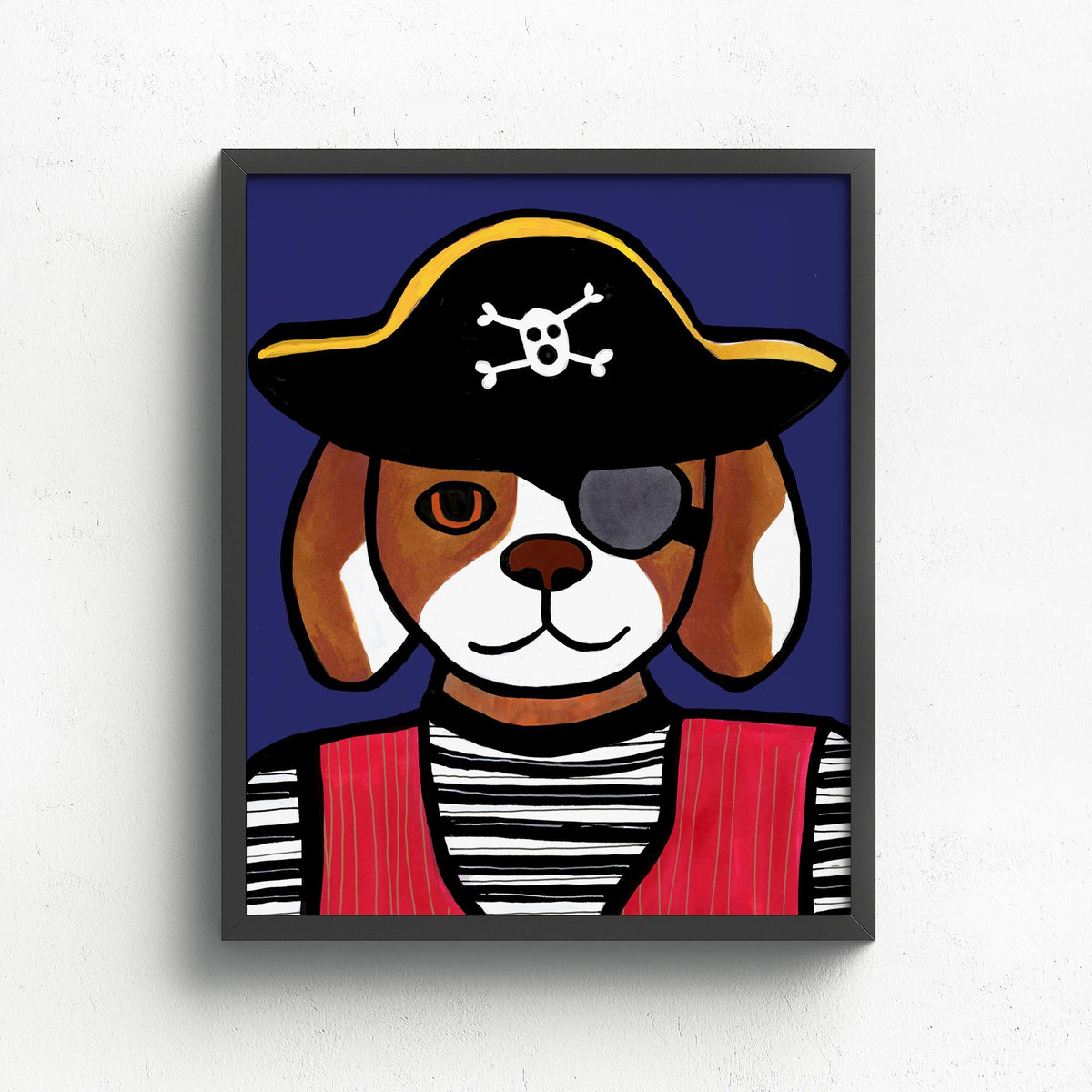 Pirate Dog Art Print shown in a black frame on a white wall. Art features a brown and white dog in a pirate costume including black skull and crossbones hat, red vest, black and white striped shirt, and eye patch. The background is dark blue.