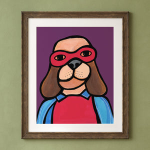 Super Hero Dog displayed in a brown wood frame and white mat on a green background