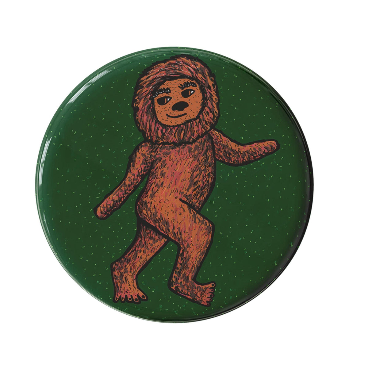 round big foot button - hand drawn big foot slightly smiling as he walks away - brown fur - green background - magnet or pin