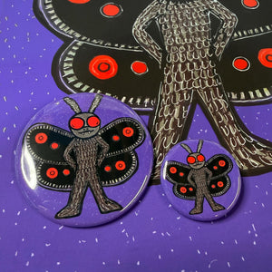 mothman buttons shown on mothman print
