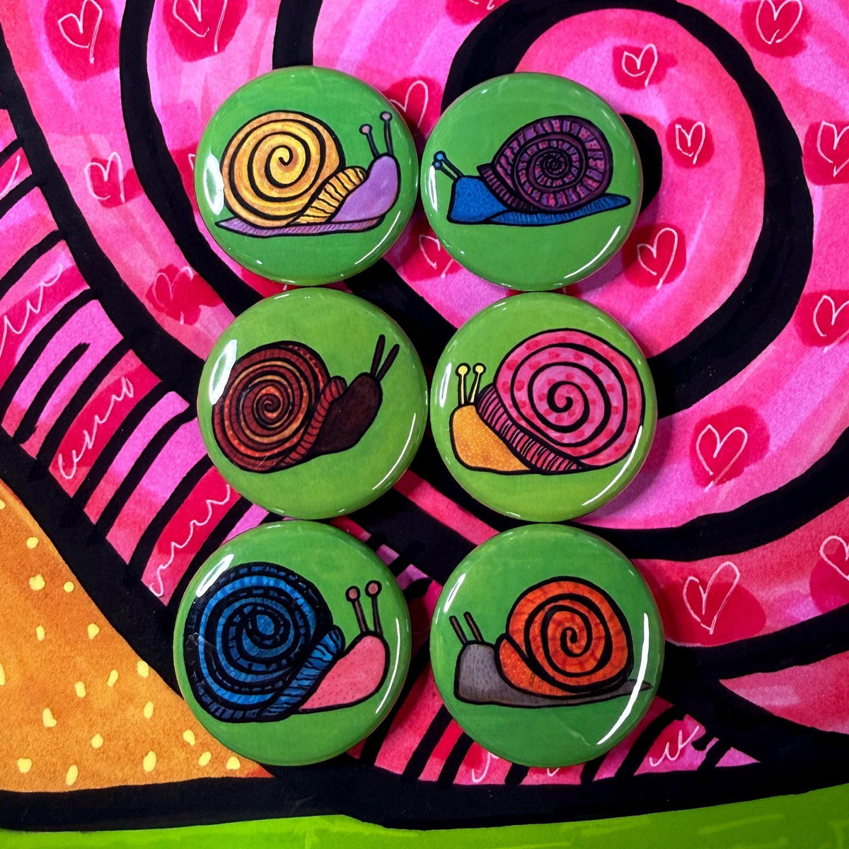 snail set shown on snail print background