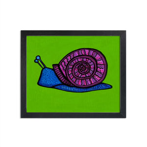 colorful snail art print featuring blue snail with purple spiral shell on a green background - shown in a black frame on white wall