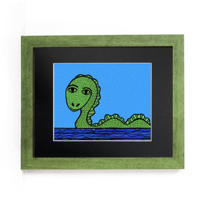 Loch Ness Monster art print shown in a green frame with black mat