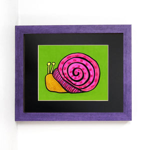 another view of the snail art print in a purple frame with black mat